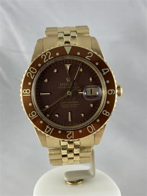 rolex 1675 gold results no crown guard auction